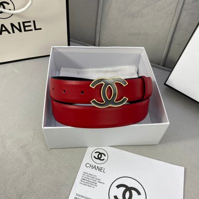Chanel belt featuring a prominent black and silver interlocking CC logo buckle — 7