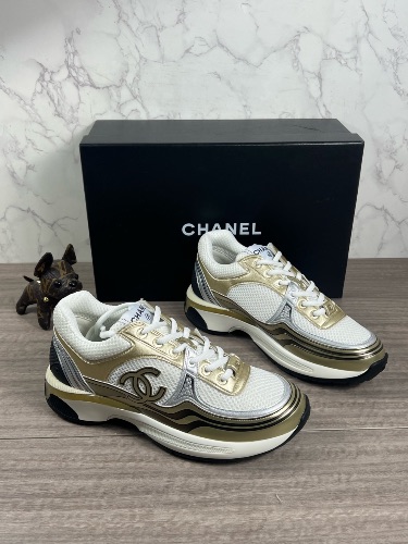 Chanel CC Runner sneakers in a white, gold, and silver — 4