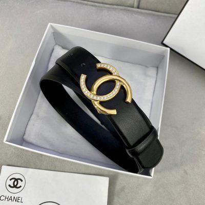 Chanel belt features a distinctive black leather strap paired with a gold-tone CC logo buckle — 3