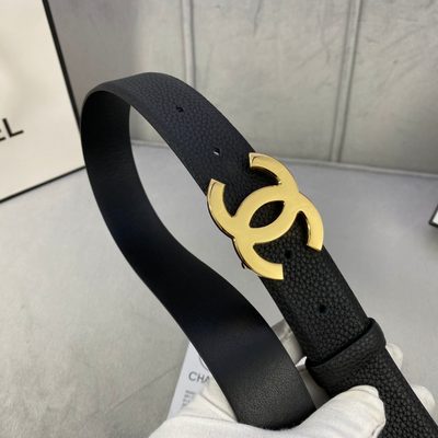 Chanel black leather belt featuring a prominent gold-toned interlocking CC logo buckle — 3
