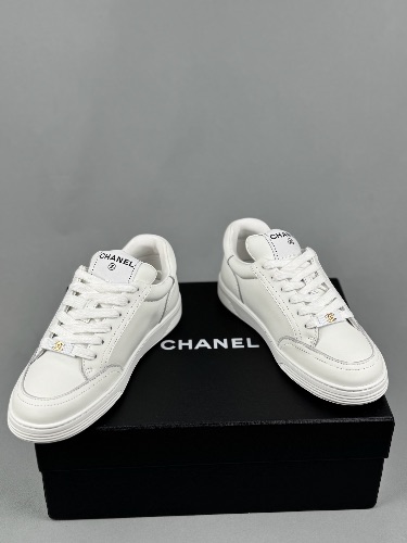 Chanel Interlocking CC Logo Sneakers in white — 4
