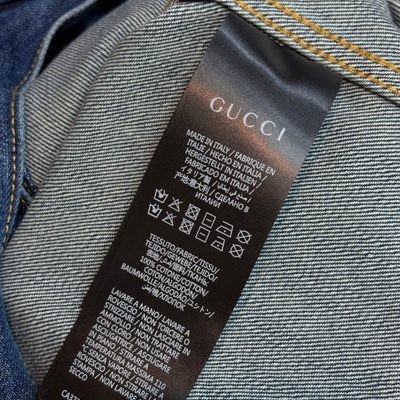 Gucci blue denim trucker jacket and matching relaxed-fit blue jeans — 8