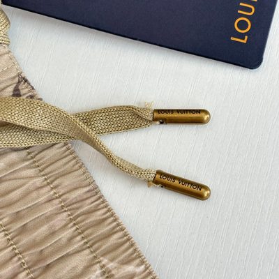 Louis Vuitton beige Monogram swim shorts — 11