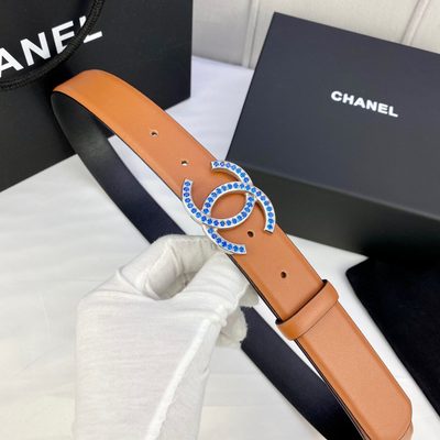 Chanel belt features a camel-colored leather strap and a gold CC logo buckle — 6