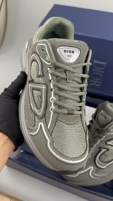 Dior B30 sneakers in grey, featuring a technical mesh and fabric design with a reflective "CD30" sig — 5