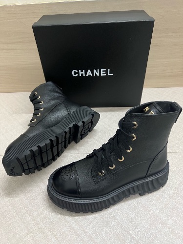 Chanel lace-up combat boots
