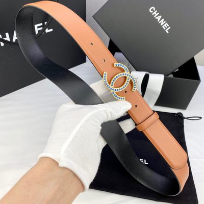 Chanel belt features a camel-colored leather strap and a gold CC logo buckle — 3
