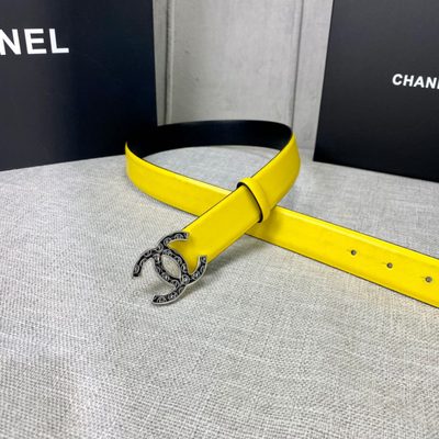 Chanel yellow leather belt features a distinctive black-filled interlocking CC logo buckle — 9