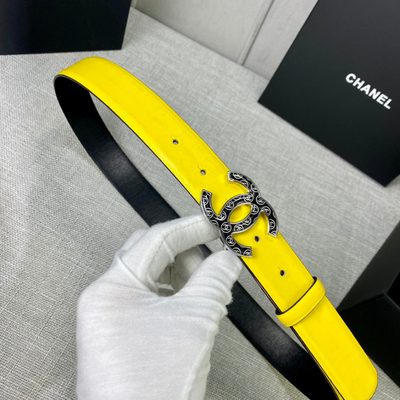 Chanel yellow leather belt features a distinctive black-filled interlocking CC logo buckle — 6