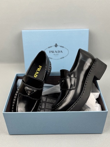 Prada Chocolate brushed leather loafers in black