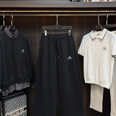 Balenciaga black long-sleeve polo-collar sweatshirt and relaxed-fit trousers — 7