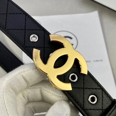 Chanel quilted leather belt featuring a prominent silver interlocking CC logo buckle — 7