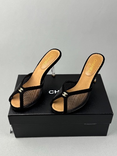 Chanel black mesh peep-toe mules featuring transparent heels and gold CC logo accents — 3