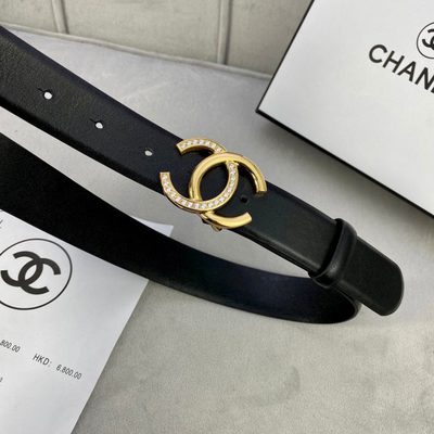 Chanel belt features a distinctive black leather strap paired with a gold-tone CC logo buckle — 4