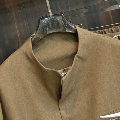 Arcteryx brown matching set featuring a zip-up jacket and wide-leg trousers — 6