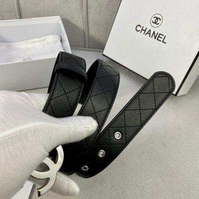 Chanel quilted leather belt featuring a prominent silver interlocking CC logo buckle — 3