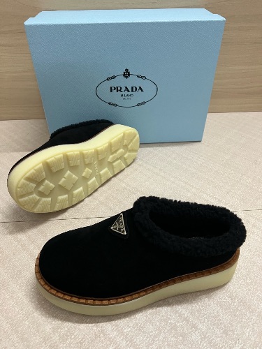 Prada suede shearling-lined platform mules in black