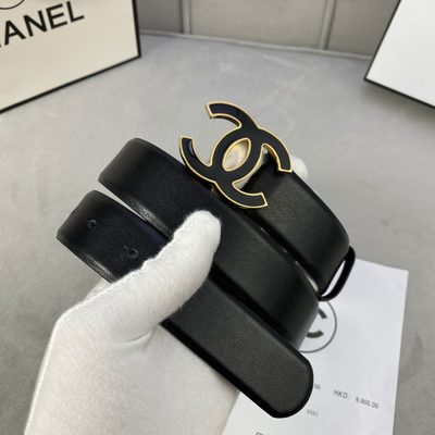 Chanel belt features a distinctive black and gold interlocking CC logo buckle — 5
