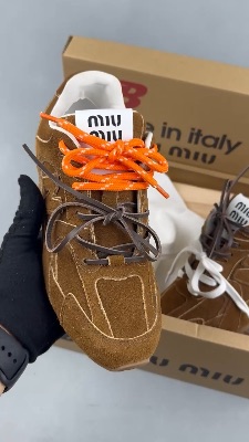 Miu Miu x New Balance 530 SL sneakers in a brown cinnamon colorway — 5