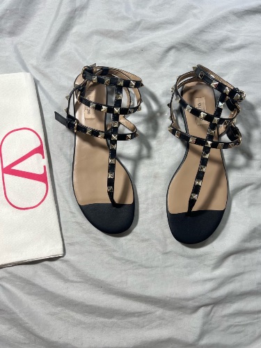 Valentino Garavani Rockstud black leather flat caged thong sandals