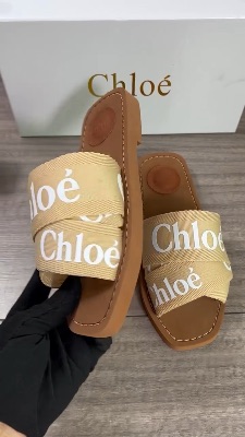 These are Chloé Woody sandals featuring beige logo-embroidered canvas crossover straps — 5