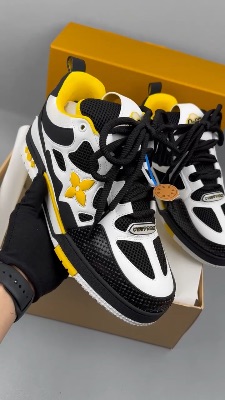 Louis Vuitton LV Skate Sneakers in a white, black, and yellow colorway — 5