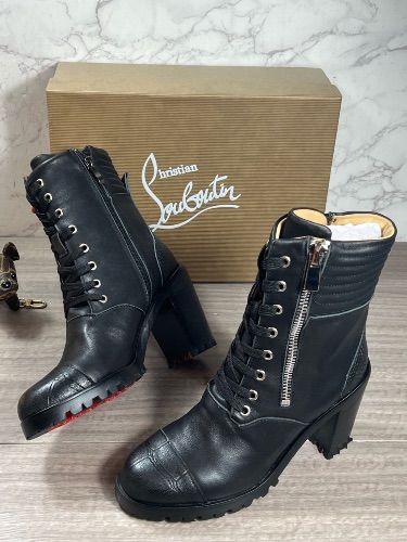 Christian Louboutin black leather En Hiver lug sole combat boots