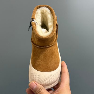 UGG-branded platform or utility-style ankle boots — 7