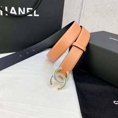 Chanel belt features a camel-colored leather strap and a gold CC logo buckle — 5