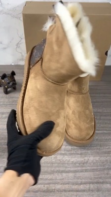 UGG Bailey Bow boots featuring a brown Louis Vuitton monogram — 5