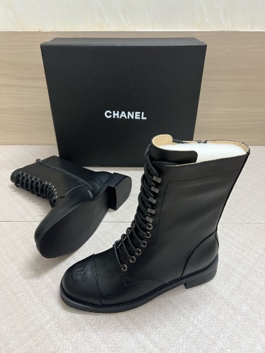Chanel black leather lace-up combat boots