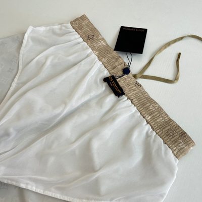 Louis Vuitton beige Monogram swim shorts — 10