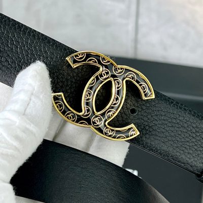 Chanel Interlocking CC Logo design featuring a distinctive patterned silver hardware buckle — 8