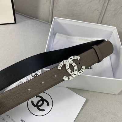 Chanel belt features a taupe, caviar-textured leather strap and a distinctive gold-tone logo buckle — 5