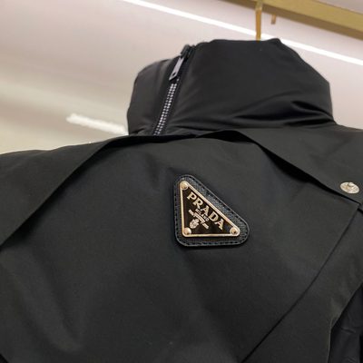 Prada-branded puffer gilet — 7