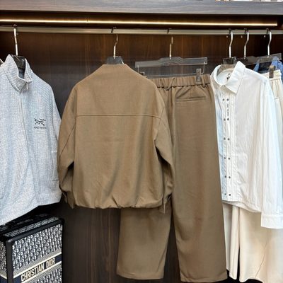 Arcteryx brown matching set featuring a zip-up jacket and wide-leg trousers — 3