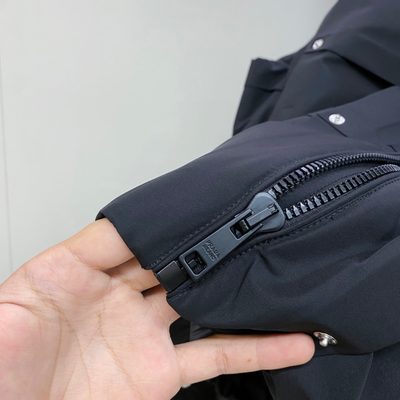 Prada-branded puffer gilet — 8