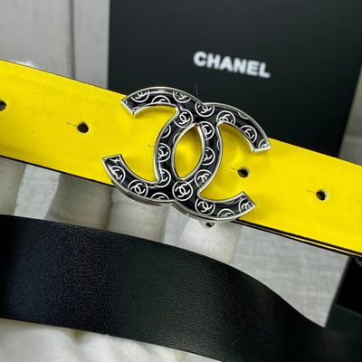 Chanel yellow leather belt features a distinctive black-filled interlocking CC logo buckle — 8