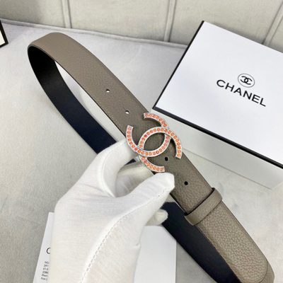 Chanel belt featuring a gold-toned CC logo buckle embellished with orange stones — 4