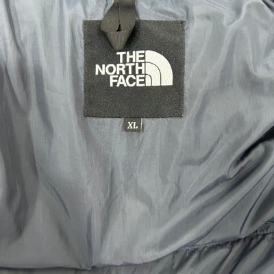 The North Face Puffer Jacket — 7
