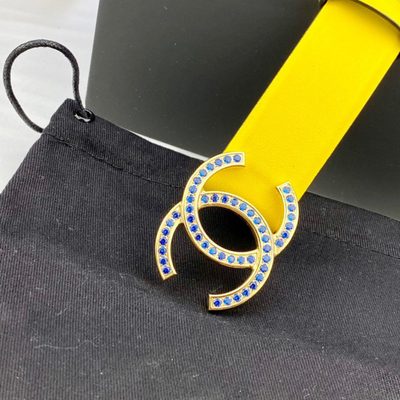 Chanel yellow patent leather belt features a signature interlocking CC buckle — 4