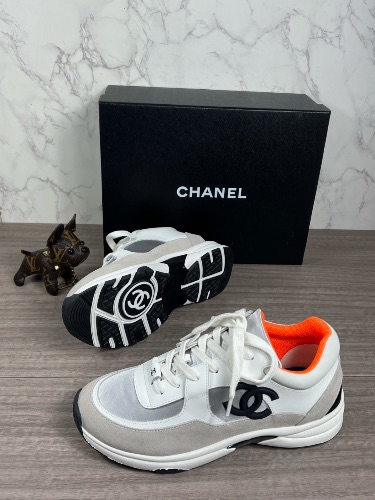CHANEL lace-up sneakers