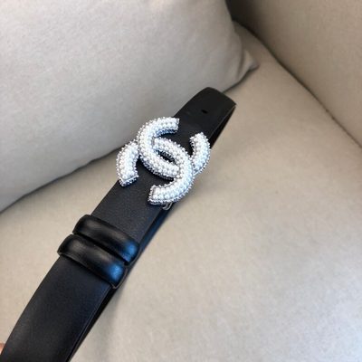 Chanel black leather belt featuring a prominent CC logo buckle — 3