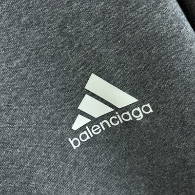 Balenciaga long-sleeve polo-collar sweatshirt and relaxed-fit trousers — 7