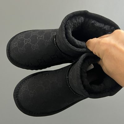 Gucci GG Monogram mini boots