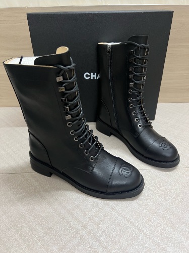 Chanel black leather lace-up combat boots — 4
