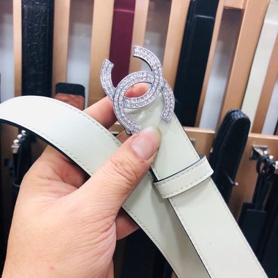 Chanel belt features a distinctive double-C buckle — 7