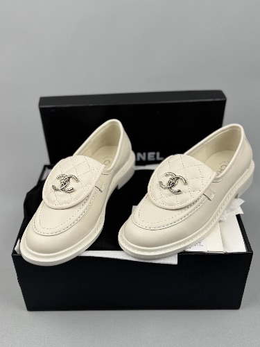 Chanel CC Turn Lock Loafers in white leather