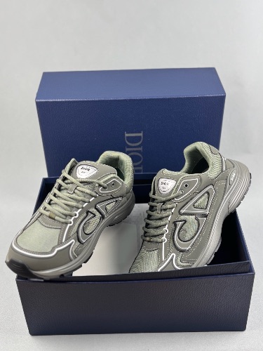 Dior B30 sneakers in grey, featuring a technical mesh and fabric design with a reflective "CD30" sig