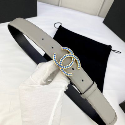 Chanel belt features a distinctive light gray leather strap and a CC logo buckle — 6
